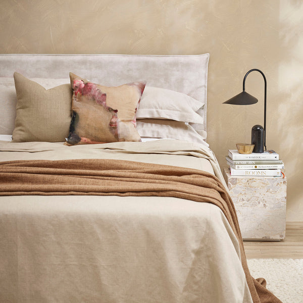 Thread Design Desert Light Linen Cushion on bed